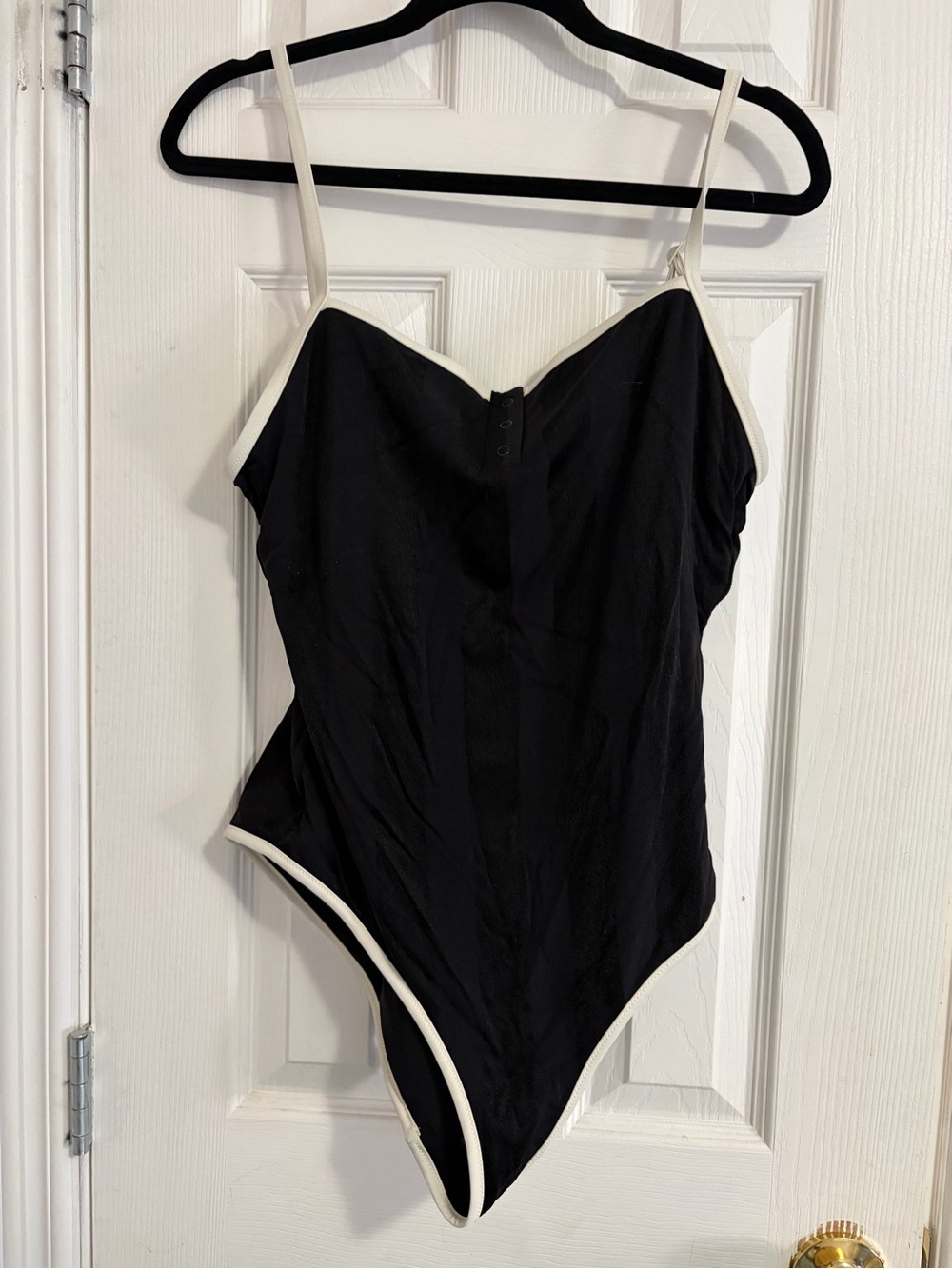 Black One-Piece Bathing Suit with White Trim